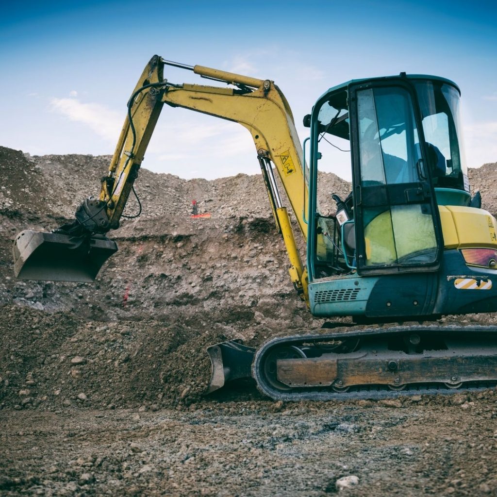 An excavator working on a construction site.